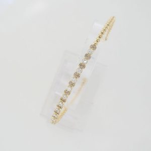 Le Vian Chocolatier® Bangle featuring 3/8 cts. Vanilla Diamonds® , 1/5 cts. Chocolate Diamonds® set in 14K Honey Gold™